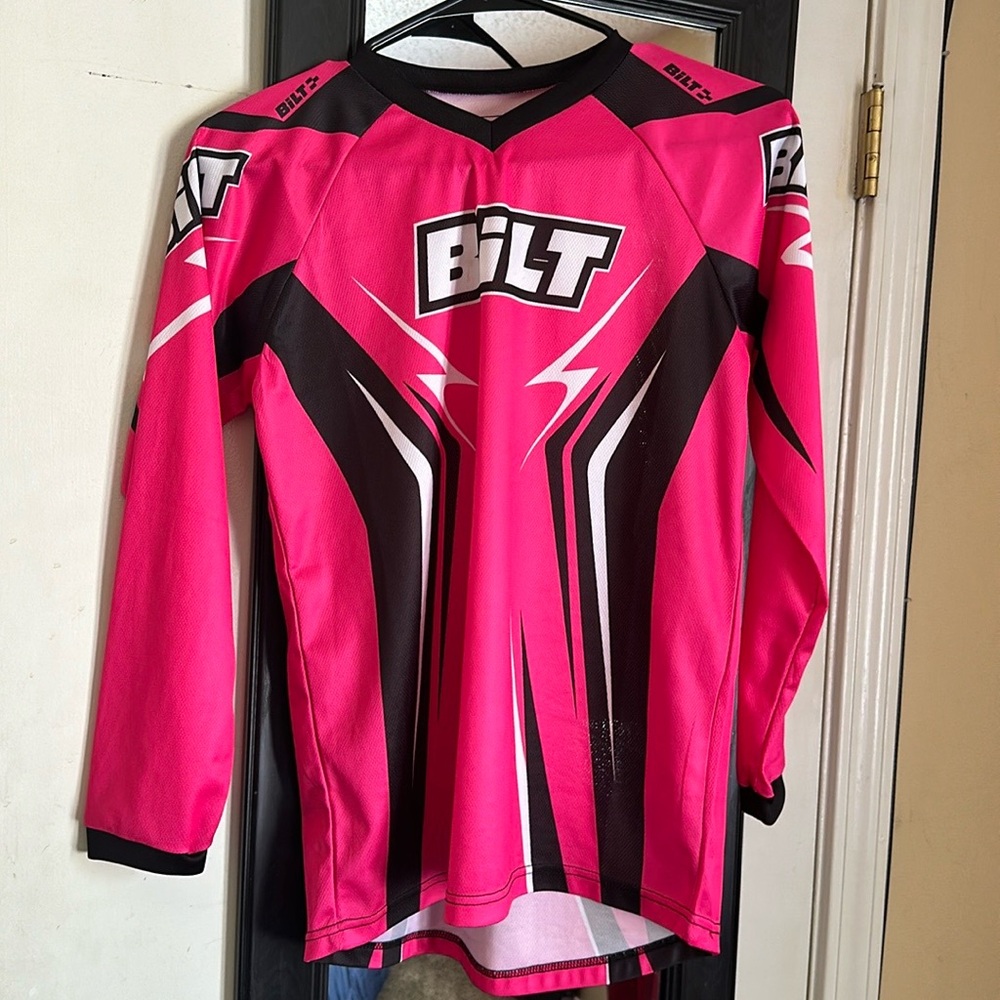 Pink black and white BILT
moto shirt